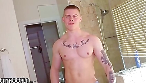 Tattooed brunette with a tattoo on her ass riding a hard pecker
