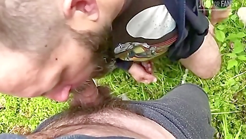 A brunette girl takes a deepthroat with her guy in the street