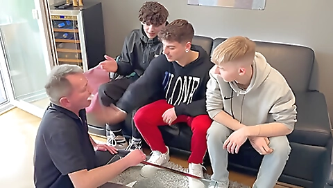 Oldy and teen play with the guy's cock in a threesome