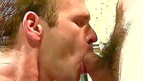 A blonde milf with huge tits enjoys deep throat sucking