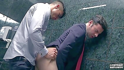 Sexy man in a sexy black dress seduces two mature men