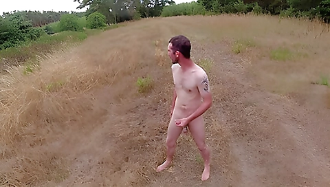 Girl is playing with a man's clothes in the fields