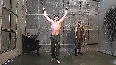 Hot brunette takes the prisoner of war and makes him guilty