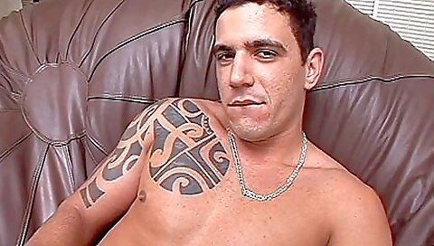 Latina with tattooed body fucked with a man in a hot video
